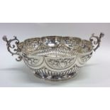 A Victorian silver half fluted bowl with floral de