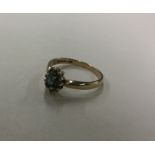 A 9 carat cluster ring. Approx. 2.1 grams. Est. £2