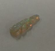An unusual brightly coloured opal in the form of a