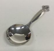 GEORG JENSEN: A stylish silver caddy spoon of text
