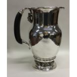 GEORG JENSEN: A massive silver ewer / pitcher attr