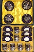 An attractive cased set of six silver mounted porc
