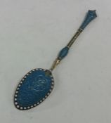 A blue enamelled Norwegian silver spoon with taper