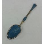 A blue enamelled Norwegian silver spoon with taper