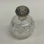 A silver and hobnail cut scent bottle. Est. £25 -