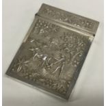 A heavy good quality Indian silver card case embos