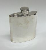 A stylish silver hip flask. Birmingham. Approx. 11