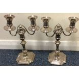 A pair of Georgian style silver plated candelabra.