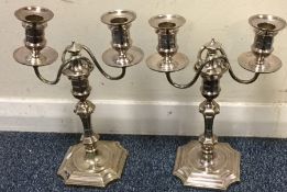 A pair of Georgian style silver plated candelabra.