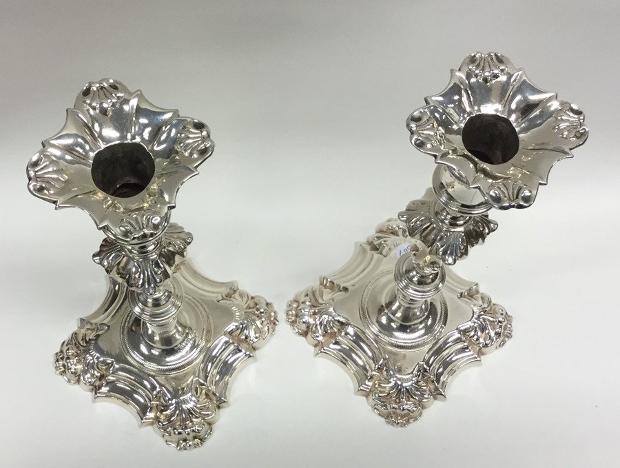 A good pair of George II cast silver candlesticks - Image 3 of 3