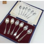 A cased set of six silver teaspoons of varying des