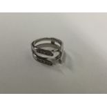 A heavy white gold and diamond ring mount. Approx.