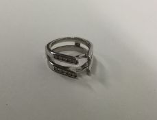 A heavy white gold and diamond ring mount. Approx.