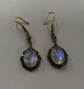 A pair of rose diamond mounted drop earrings with