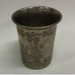 A Continental silver tapering beaker decorated wit