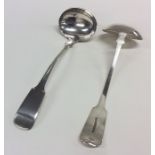 A pair of Scottish Provincial silver sauce ladles.