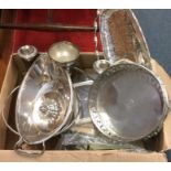 A box containing silver plated items. Est. £10 - £