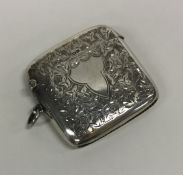 A large silver engraved vesta case of typical desi