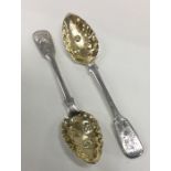 An unusual pair of silver and silver gilt fruit sp