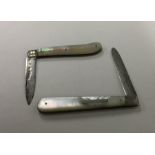 Two silver and MOP fruit knives with engraved deco