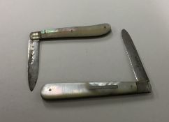 Two silver and MOP fruit knives with engraved deco