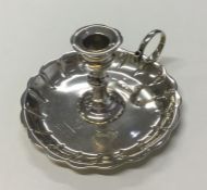 EXETER: A good silver chamberstick with shaped bor
