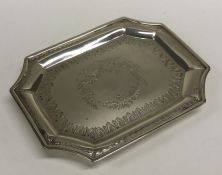 A George III bright cut silver teapot stand with c