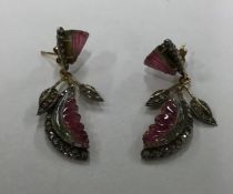 A pair of unusual amethyst mounted drop earrings i