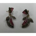 A pair of unusual amethyst mounted drop earrings i