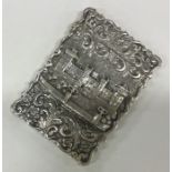 A large castle top silver card case depicting Wind