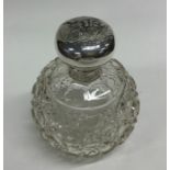 A silver and hobnail cut scent bottle. Est. £50 -