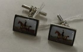 A pair of modern silver and enamelled cufflinks mo