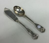 A Kings' pattern silver butter knife together with