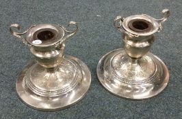 A pair of stylish American silver candlesticks dec