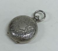 A good quality engraved silver sovereign case. Bir