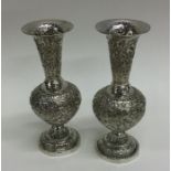 A pair of fine silver Persian vases with scroll de