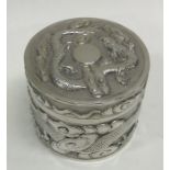 A large Chinese silver box chased with dragons and