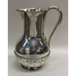 JOHN HARDMAN &CO: A rare silver ewer of Pugin desi