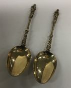 A pair of silver gilt Apostle top spoons. London.