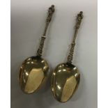 A pair of silver gilt Apostle top spoons. London.