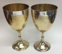 A pair of good quality silver and parcel gilt gobl