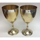 A pair of good quality silver and parcel gilt gobl