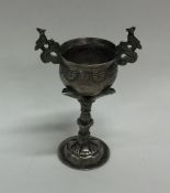 An unusual South American silver two handled cup o