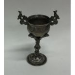 An unusual South American silver two handled cup o