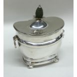 An attractive Edwardian silver tea caddy with pine