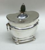 An attractive Edwardian silver tea caddy with pine