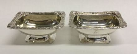 A good pair of crested silver salts with gilt inte