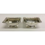 A good pair of crested silver salts with gilt inte