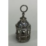 An unusual miniature silver candle holder in the f