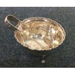 A silver sugar bowl together with a pair of rat ta